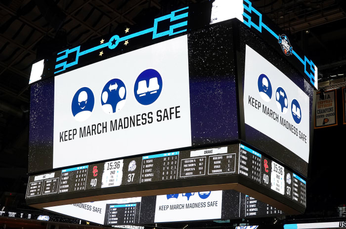 A sign urges fans to "Keep March Madness Safe"